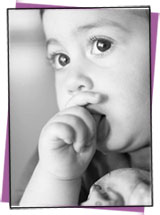 Boy sucking thumb photo